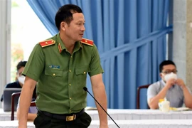 Thiếu tướng Vũ Hồng Văn thông tin về việc khởi tố đối tượng mạo danh Vụ trưởng Thanh tra Chính phủ. (Ảnh: Công Phong/TTXVN) 