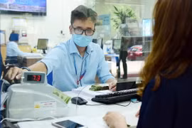 Llãi suất tiết kiệm dao động từ 4,7% đến 6,35%/năm đối với các kỳ hạn phổ biến từ 6 đến 12 tháng. (Ảnh: Trần Việt/TTXVN)