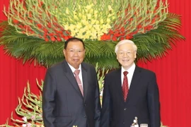 Sáng 3/7/2018, tại Trụ sở Trung ương Đảng, Tổng Bí thư Nguyễn Phú Trọng đón và hội đàm với Tổng Bí thư, Chủ tịch nước Lào Bounnhang Vorachith. (Ảnh: Trí Dũng/TTXVN)