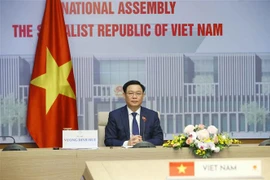 Chủ tịch Quốc hội Vương Đình Huệ hội đàm trực tuyến với Chủ tịch Nhân đại Trung Quốc Lật Chiến Thư. (Ảnh: Doãn Tấn/TTXVN) 