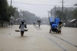 Cảnh ngập lụt tại Sylhet, Bangladesh. (Ảnh: THX/TTXVN) 