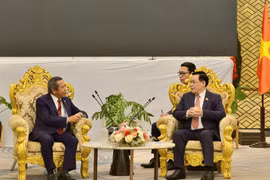 Chủ tịch Quốc hội Vương Đình Huệ tiếp Bộ trưởng Bộ Công nghệ và Truyền thông, Chủ tịch Hội hữu nghị Lào-Việt Nam Boviengkham Vongdara. (Ảnh: TTXVN) 