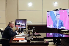 Tổng thống Nga Vladimir Putin tại cuộc gặp trực tuyến với Chủ tịch Trung Quốc Tập Cận Bình ngày 15/12/2021. (Ảnh: AFP/TTXVN) 