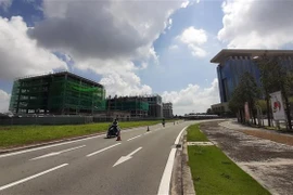 Trụ sở công trình vốn đầu tư công gần Trung tâm hành chính công tỉnh Bình Dương được gấp rút hoàn thành tại thành phố mới Bình Dương. (Ảnh: Chí Tưởng/TTXVN) 