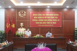 Chủ tịch Ủy ban Nhân dân tỉnh Bình Dương Võ Văn Minh chia sẻ nhiều kinh nghiệm được rút ra trong công tác phòng, chống dịch COVID-19 tại địa phương. (Ảnh: Huỳnh Anh/TTXVN) 