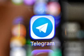 Biểu tượng của Telegram trên màn hình điện thoại. (Nguồn: AFP/TTXVN) 