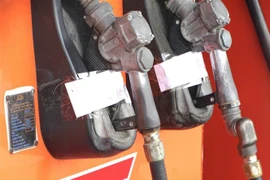 Cây xăng đã được lực lượng công an niêm phong. (Nguồn: TTXVN phát) 