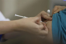 Tiêm vaccine phòng COVID-19. (Ảnh: Minh Quyết/TTXVN) 