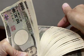 Đồng tiền mệnh giá 10.000 yen của Nhật Bản. (Ảnh: AFP/TTXVN) 