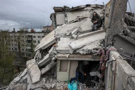 Tòa nhà bị phá hủy do xung đột tại Sloviansk, Ukraine, ngày 14/4/2023. (Ảnh: AFP/TTXVN)