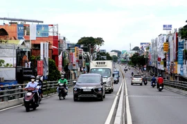 Giao thông đông đúc trên đường Nguyễn Oanh (quận Gò Vấp) sáng 13/8. (Ảnh: Thành Chung/TTXVN) 