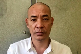 Đối tượng Nguyễn Văn Dũng (tức Dũng trọc). (Ảnh: Thanh Hải/TTXVN) 
