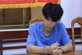 Hung thủ Bùi Trọng Nghĩa tại cơ quan điều tra. (Nguồn: TTXVN phát) 