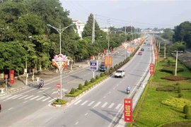 Nhịp sống của người dân thành phố Vĩnh Yên dần trở lại trạng thái bình thường mới trong ngày 19/5. (Ảnh: Hoàng Hùng/TTXVN) 