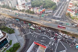 Công trình được kỳ vọng giải quyết xung đột giao thông tại nút giao Lê Văn Lương-Khuất Duy Tiến-Tố Hữu nói riêng và tình trạng ùn tắc khu vực phía Tây Nam của Thủ đô nói chung. (Ảnh: Tuấn Anh/TTXVN) 