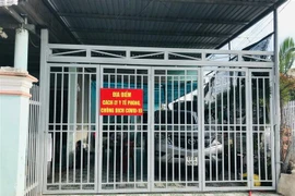 Thí điểm đầu tiên cách ly F1 tại nhà ở xã Lai Hưng, huyện Bàu Bàng (Bình Dương). (Ảnh: TTXVN phát) 