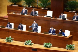 Thủ tướng Phạm Minh Chính trả lời chất vấn của đại biểu Quốc hội. (Ảnh: Doãn Tấn/TTXVN) 