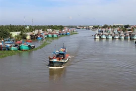 Tàu cá của ngư dân neo đậu trên sông Cái Bé thuộc địa bàn huyện Châu Thành, Kiên Giang. (Ảnh: Lê Huy Hải/TTXVN)