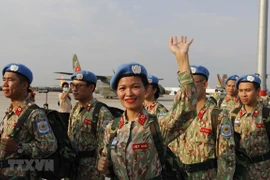 Những người lính quân y mũ nồi xanh của Việt Nam. (Ảnh: Thanh Vũ/TTXVN) 