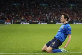 Niềm vui của tiền vệ Italy Federico Chiesa khi ghi bàn thắng vào lưới đội Tây Ban Nha trong trận đấu ở bán kết EURO 2020 trên sân Wembley, London (Anh) ngày 6/7/2021. (Nguồn: AFP/TTXVN) 
