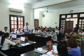 Quang cảnh phiên tòa xét xử 3 bị cáo trong vụ sập giàn giáo làm 4 người chết ở công trình 16A Nguyễn Công Trứ, Hà Nội, tại Tòa án Nhân dân quận Hai Bà Trưng hôm 28/6/2022. (Ảnh: Kim Anh/TTXVN)