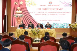 Phó Thủ tướng Thường trực Trương Hòa Bình với lãnh đạo Thanh tra Chính phủ chủ trì Hội nghị. (Ảnh: Văn Điệp/ TTXVN) 