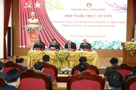 Phó Thủ tướng Thường trực Trương Hòa Bình với lãnh đạo Thanh tra Chính phủ chủ trì Hội nghị. (Ảnh: Văn Điệp/ TTXVN) 
