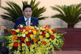 Ông Lương Nguyễn Minh Triết, Ủy viên dự khuyết Trung ương Đảng, Phó Bí thư thường trực Thành ủy, Chủ tịch Hội đồng Nhân dân thành phố Đà Nẵng khóa X phát biểu nhận nhiệm vụ. (Ảnh: Quốc Dũng/TTXVN) 