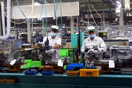 Hoạt động sản xuất tại Toyota Việt Nam. (Ảnh: Danh Lam/TTXVN) 