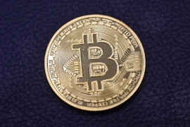 Đồng tiền kỹ thuật số Bitcoin. (Ảnh: AFP/TTXVN)