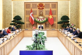 Thủ tướng Phạm Minh Chính hội đàm trực tuyến với Thủ tướng Đan Mạch Mette Frederiksen. (Ảnh: Dương Giang/TTXVN)
