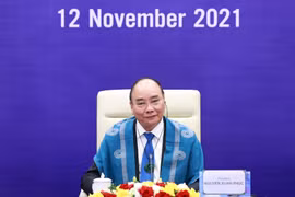 Chủ tịch nước Nguyễn Xuân Phúc tham dự Hội nghị các nhà Lãnh đạo kinh tế APEC lần thứ 28 được tổ chức theo hình thức trực tuyến. (Ảnh: Thống Nhất/TTXVN)