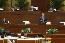 Bộ trưởng Bộ Tài chính Hồ Đức Phớc phát biểu giải trình, làm rõ một số vấn đề đại biểu Quốc hội nêu. (Ảnh: Doãn Tấn/TTXVN) 
