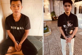 Hai trong 4 đối tượng tại cơ quan công an. (Ảnh: TTXVN phát)