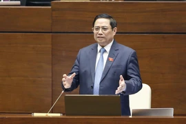 Thủ tướng Chính phủ Phạm Minh Chính trả lời chất vấn các vị đại biểu Quốc hội. (Ảnh: Doãn Tấn/TTXVN) 