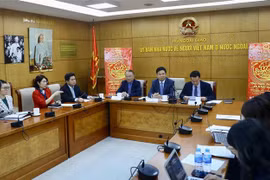 Lãnh đạo Ủy ban Nhà nước về người Việt Nam ở nước ngoài báo cáo về tình hình kiều bào trong năm qua. (Ảnh: Lâm Khánh/TTXVN)