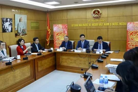 Lãnh đạo Ủy ban Nhà nước về người Việt Nam ở nước ngoài báo cáo về tình hình kiều bào trong năm qua. (Ảnh: Lâm Khánh/TTXVN)