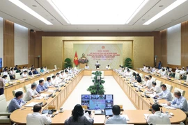Quang cảnh một hội nghị đẩy mạnh cải cách thủ tục hành chính do Thủ tướng Phạm Minh Chính, Trưởng Ban Chỉ đạo cải cách hành chính của Chính phủ, chủ trì. (Ảnh: Dương Giang/TTXVN)
