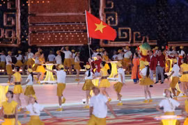 Đoàn Thể thao Việt Nam diễu hành tại Lễ khai mạc ASIAD 19. (Ảnh: Hoàng Linh/TTXVN)