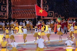 Đoàn Thể thao Việt Nam diễu hành tại Lễ khai mạc ASIAD 19. (Ảnh: Hoàng Linh/TTXVN)