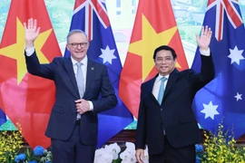 Thủ tướng Phạm Minh Chính và Thủ tướng Australia Anthony Albanese. (Ảnh: Dương Giang/TTXVN)