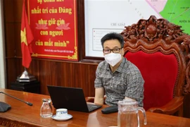 Phó Thủ tướng Vũ Đức Đam chủ trì buổi làm việc. (Ảnh: TTXVN phát) 