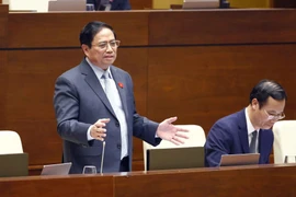 Thủ tướng Chính phủ Phạm Minh Chính trả lời chất vấn. (Ảnh: Doãn Tấn/TTXVN) 