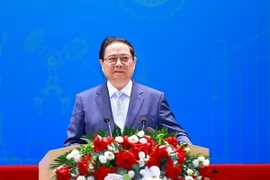 Thủ tướng Phạm Minh Chính phát biểu tại Diễn đàn Nâng cao Năng suất Lao động Quốc gia năm 2024. (Ảnh: Dương Giang/TTXVN)