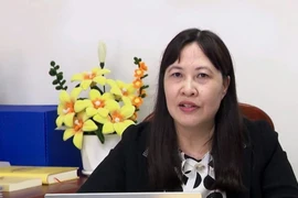 Thạc sỹ Nguyễn Thị Thủy, Trưởng Khoa Xây dựng Đảng, Trường Chính trị tỉnh Bình Dương rất quan tâm tới nội dung về bài viết của Tổng Bí thư, Chủ tịch nước Tô Lâm. (Ảnh: Dương Chí Tưởng/TTXVN)