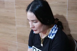 Đối tượng Sen bị bắt giữ. (Ảnh: TTXVN phát)