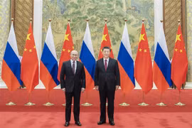 Tổng thống Nga Vladimir Putin (trái) và Chủ tịch Trung Quốc Tập Cận Bình (phải) tại cuộc gặp ở Bắc Kinh ngày 4/2/2022. (Ảnh: THX/TTXVN) 