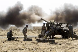 Binh sỹ Ukraine trong cuộc tập trận tại thành phố miền Đông Mariupol. (Nguồn: AFP/TTXVN) 