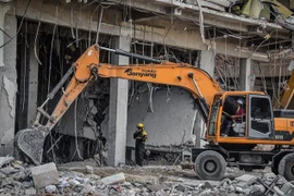 Hiện trường vụ nổ. (Ảnh: AFP/TTXVN) 