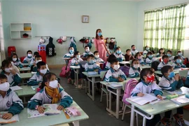 Các trường học đều thực hiện nghiêm túc các biện pháp phòng, chống dịch COVID-19 cho học sinh. (Ảnh: Hồng Điệp/TTXVN)
